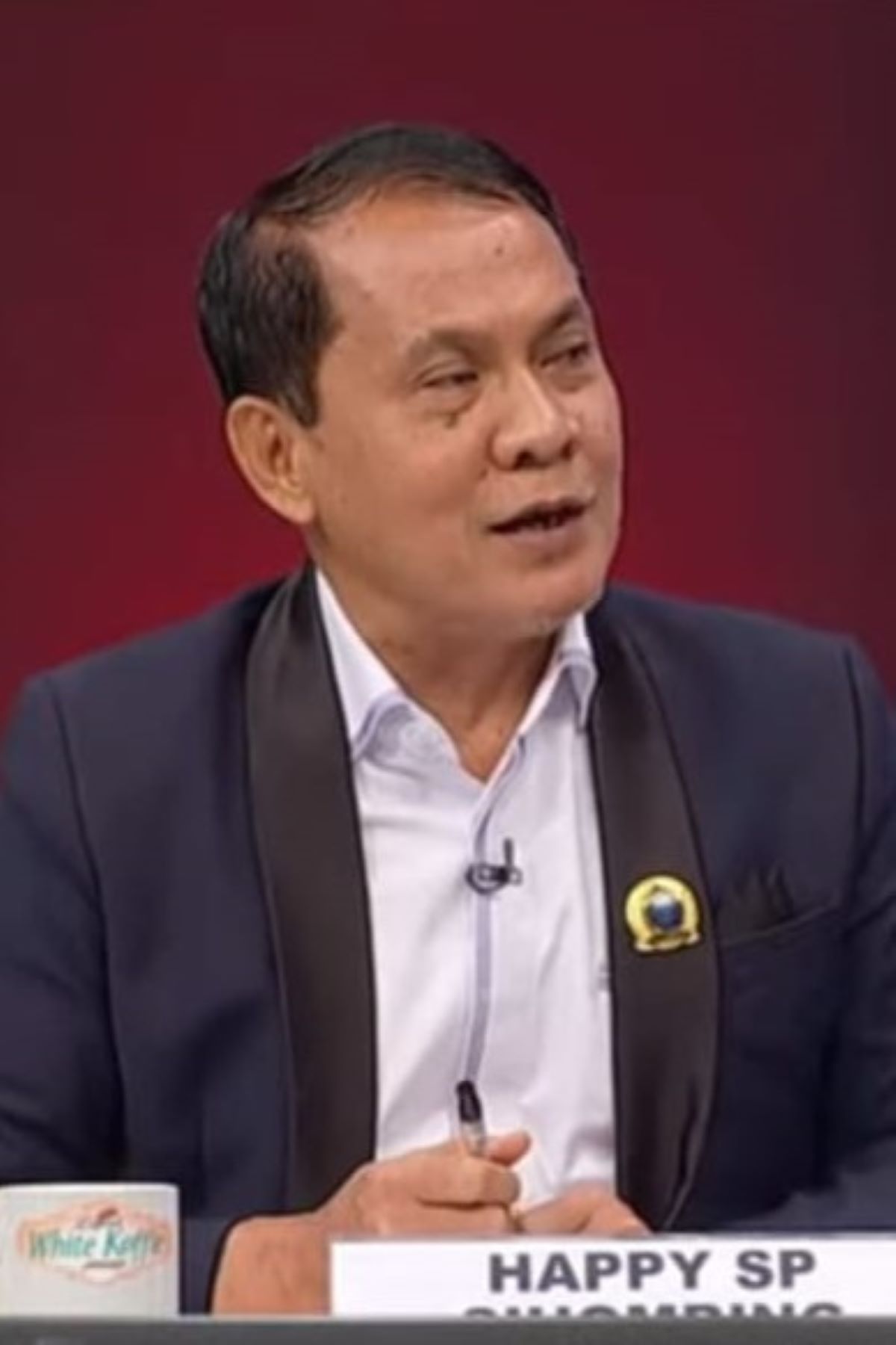 HAPPY SP SIHOMBING, S.H, MH.